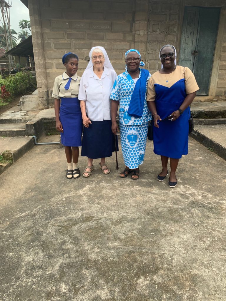 A student escorts us to the Assembly ground, Sr Ann Schulte, Irene Ekeng, and Genevieve, the last two are Calabar Old Girls of 1974 and 1999 sets respectively